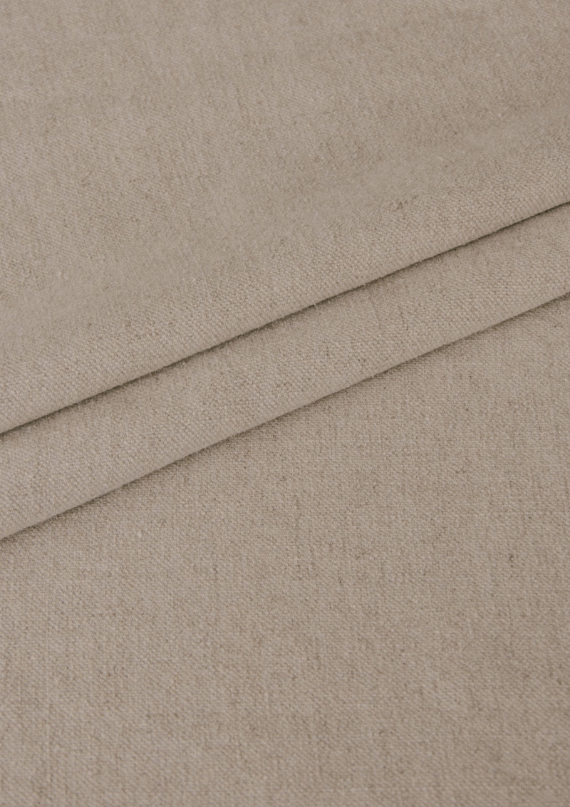 SAHA fabric roll showing natural color and texture