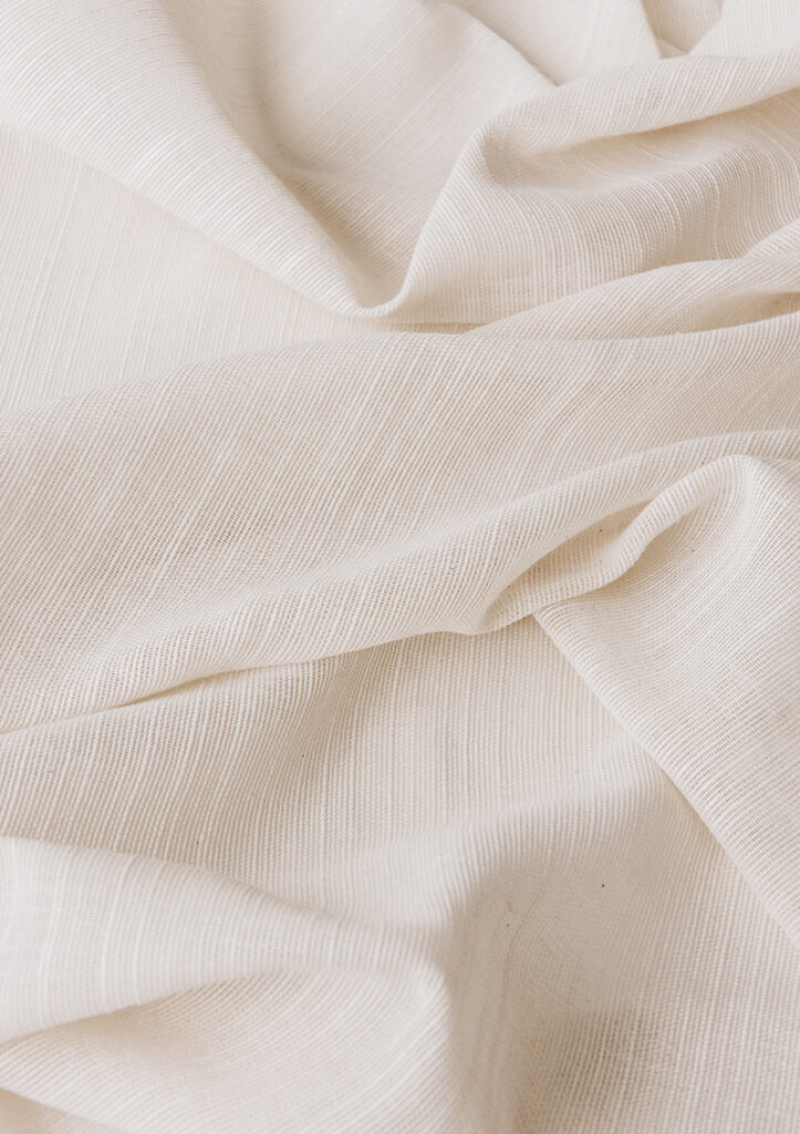 Fabric samples of VANOL curtain fabric showing five slub yarn colors.