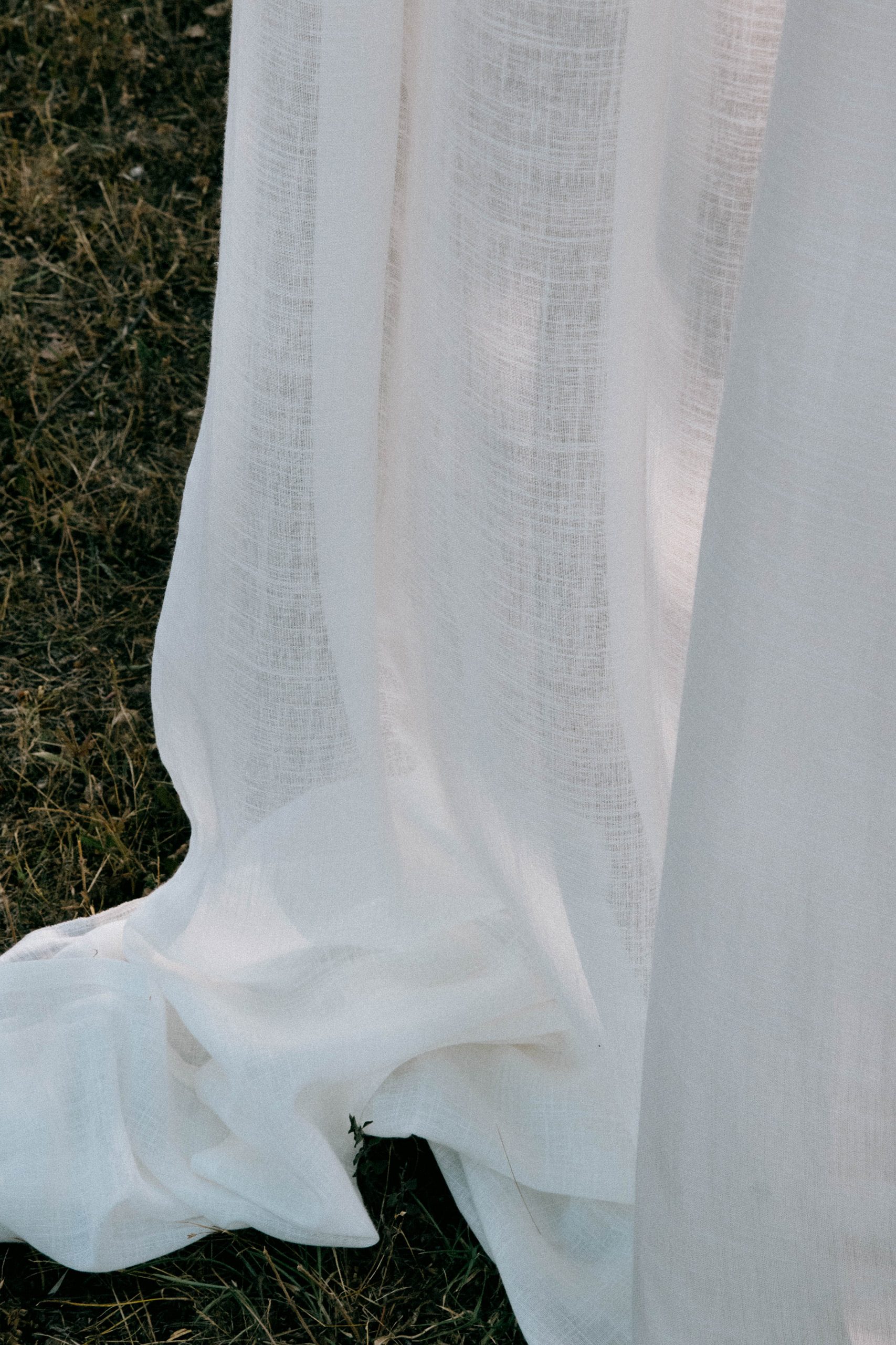 Curtains made with Mikonos fabric installed in a coastal-style interior