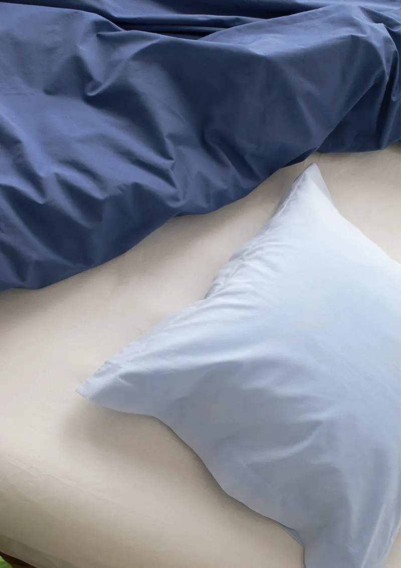 Ropa de cama profesional Cassa Nova – glaciar, nieve e índigo.