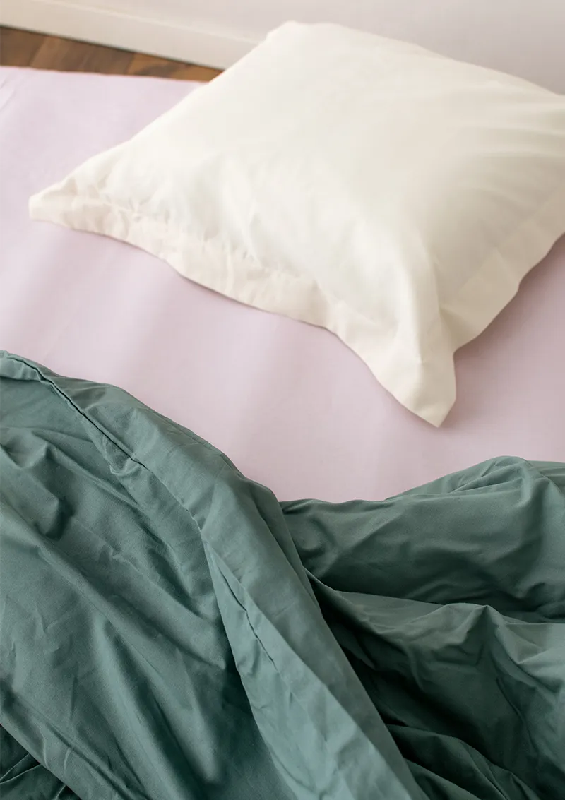 Cassa Nova Open Stock – cuadrante nieve, funda nórdica jade, encimera rosado.