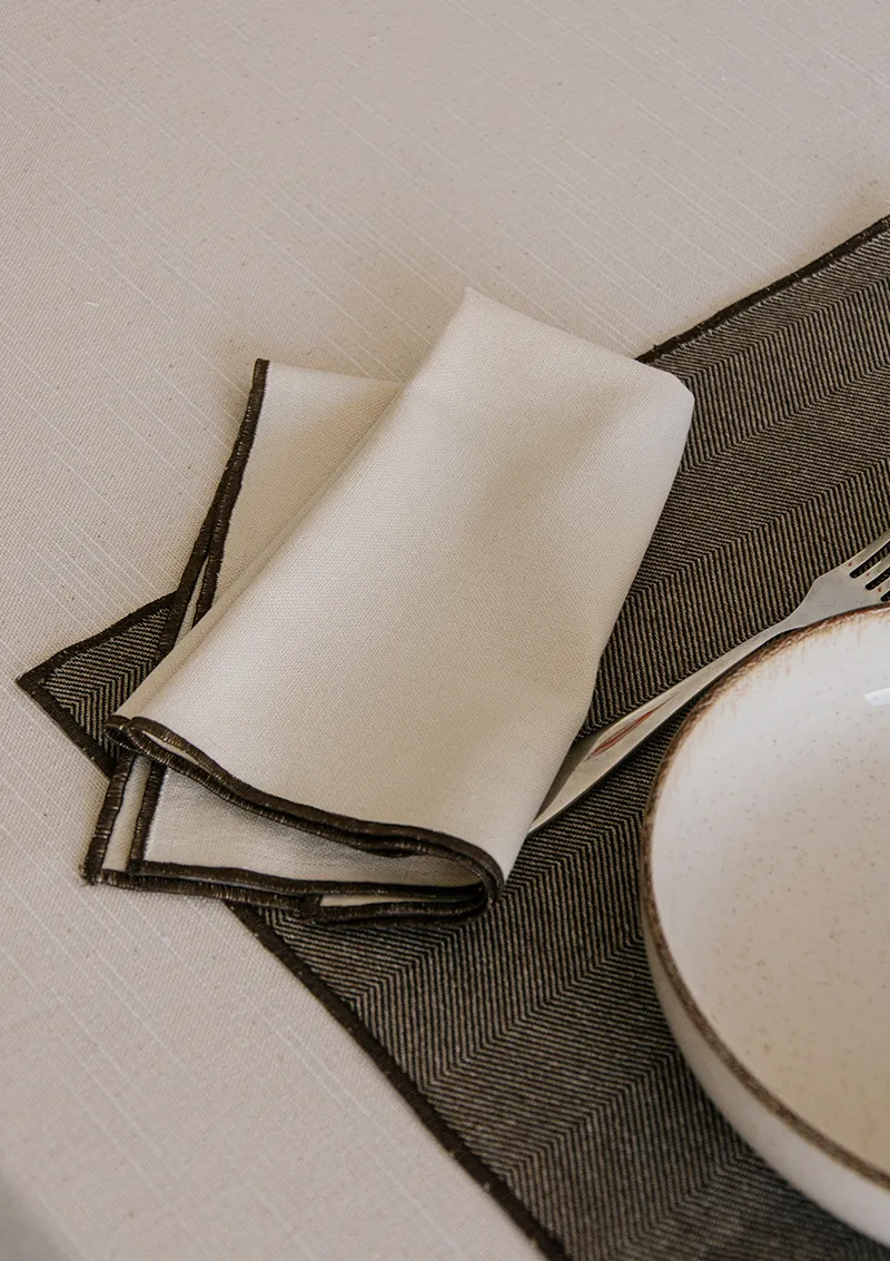 Individuales y servilletas personalizados con acabado overlock