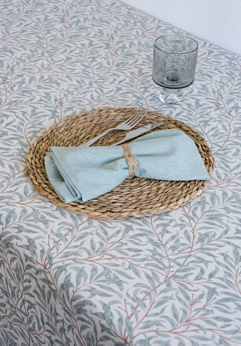 DARSI tablecloth with LAGOS teal napkin, Williams Collection textile
