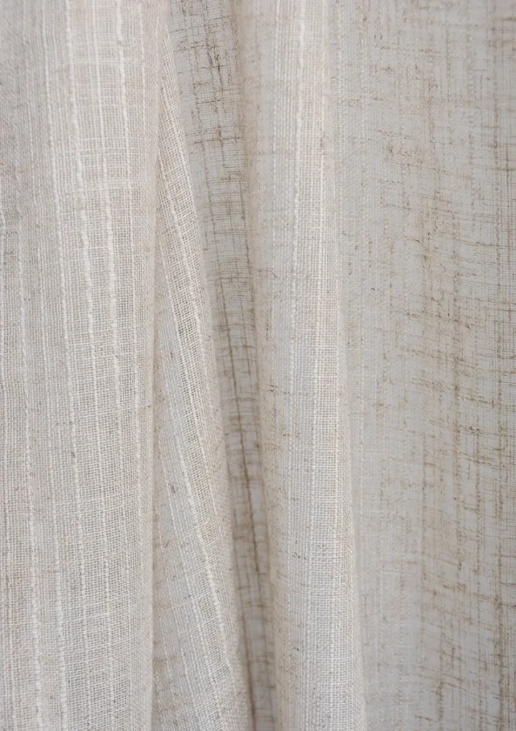 BELLUNO Collection. CASTOI sheer curtain fabric. Fantasy yarn. Natural linen color
