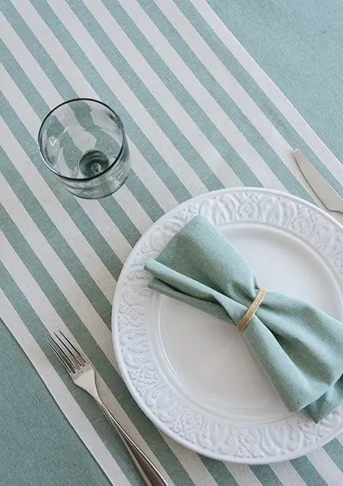 SONBOU Collection fabrics in a natural interior setting. SONBOU fabric used for contemporary interior. Green colour.